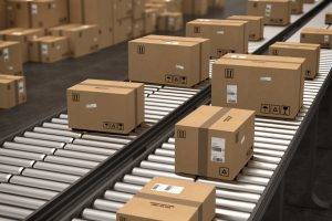 Closed cardboard boxes and wrapped with adhesive on conveyor roller
